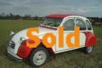 Nicely restored red and white 2CV Dolly