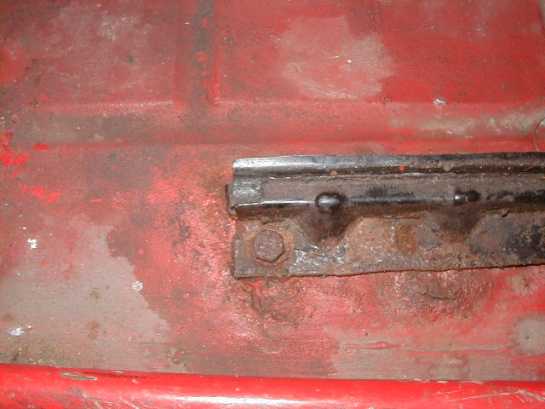 Picture 5 Dangerously rusted loose seat runner