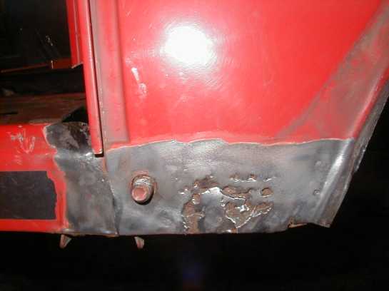 Picture 2 Rusted front end of the rocker panel