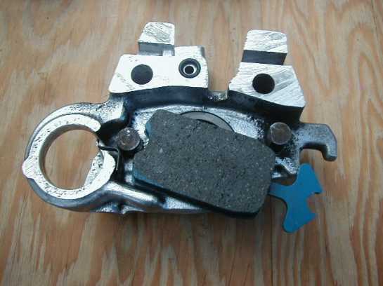 How to insert the new brake pad
